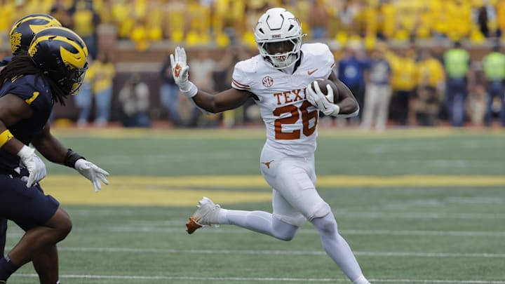 Sep 7, 2024; Ann Arbor, Michigan, USA; Texas Longhorns running back Quintrevion Wisner (26) rushes in the first half against the Michigan Wolverines at Michigan Stadium. Mandatory Credit: Rick Osentoski-Imagn Images