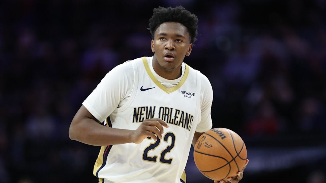 Jan 31, 2026; Philadelphia, Pennsylvania, USA; New Orleans Pelicans center Derik Queen (22) controls the ball against the Philadelphia 76ers during the first quarter at Xfinity Mobile Arena. Mandatory Credit: Bill Streicher-Imagn Images