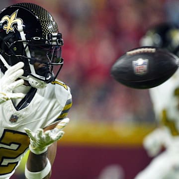 Oct 7, 2024; Kansas City, Missouri, USA; New Orleans Saints wide receiver Chris Olave (12) catches a pass during the second half against the Kansas City Chiefs at GEHA Field at Arrowhead Stadium. Mandatory Credit: Jay Biggerstaff-Imagn Images