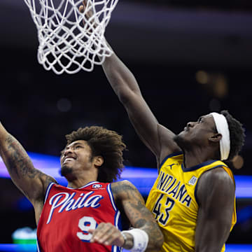 Dec 13, 2024; Philadelphia, Pennsylvania, USA; Philadelphia 76ers guard Kelly Oubre Jr. (9) drives for a shot past Indiana Pacers forward Pascal Siakam (43) during the third quarter at Wells Fargo Center. Mandatory Credit: Bill Streicher-Imagn Images