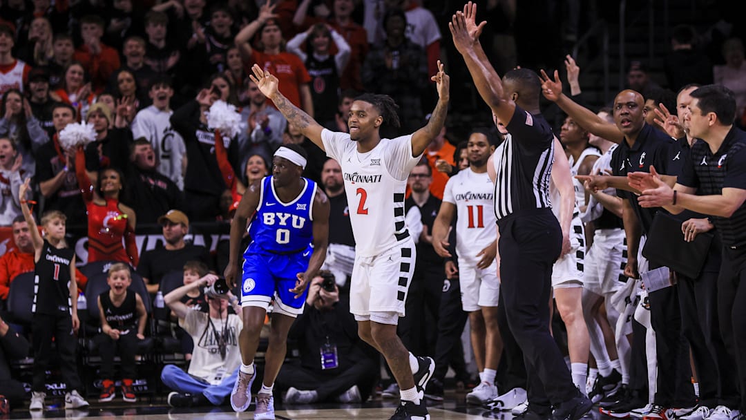 Feb 8, 2025; Cincinnati, Ohio, USA; Cincinnati Bearcats guard Jizzle James (2) reacts after a play against the Brigham Young Cougars in the second half at Fifth Third Arena. Mandatory Credit: Katie Stratman-Imagn Images