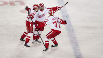 Mar 1, 2025; Columbus, Ohio, USA;  Detroit Red Wings right wing Alex DeBrincat (93) celebrates with teammates after scoring a goal against the Columbus Blue Jackets in the third period at Ohio Stadium. Mandatory Credit: Aaron Doster-Imagn Images