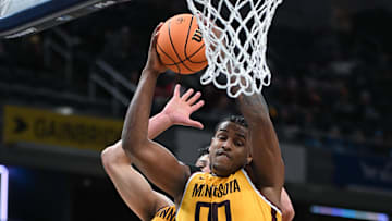 Mar 12, 2025; Indianapolis, IN, USA; Minnesota Golden Gophers forward Frank Mitchell (00) rebounds the ball during the second half against the Northwestern Wildcats at Gainbridge Fieldhouse. Mandatory Credit: Robert Goddin-Imagn Images