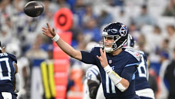 Dec 22, 2024; Indianapolis, Indiana, USA; Tennessee Titans quarterback Mason Rudolph (11) throws a pass during the first quarter against the Indianapolis Colts at Lucas Oil Stadium. Mandatory Credit: Marc Lebryk-Imagn Images