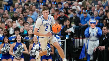 Mar 21, 2025; Raleigh, NC, USA; Duke Blue Devils forward Cooper Flagg (2) dribbles the ball against the Mount St. Mary's Mountaineers during the first half in the first round of the NCAA Tournament at Lenovo Center. Mandatory Credit: Bob Donnan-Imagn Images