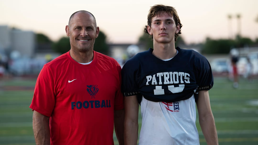 Queen Creek assistant coach Nathan LaDuke and defensive back Nate LaDuke (10) on Sept. 26, 2023, at American Leadership Queen Creek's football field.