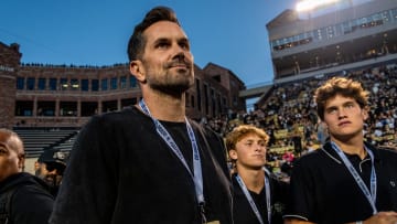 Heisman-winning quarterback Matt Leinart, a member of the Fox Big Noon Kickoff crew, walks the CU sideline before the Rocky Mountain Showdown on Sept. 16, 2023 at Folsom Field in Boulder, Colo.