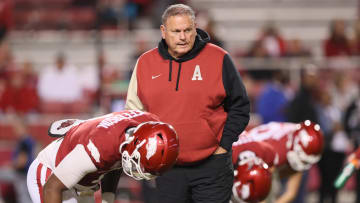 Nov 18, 2023; Fayetteville, Arkansas, USA; Arkansas Razorbacks head coach Sam Pittman talks to quarterback KJ Jefferson (1) prior to the game against the FIU Panthers at Donald W. Reynolds Razorback Stadium. Mandatory Credit: Nelson Chenault-USA TODAY Sports