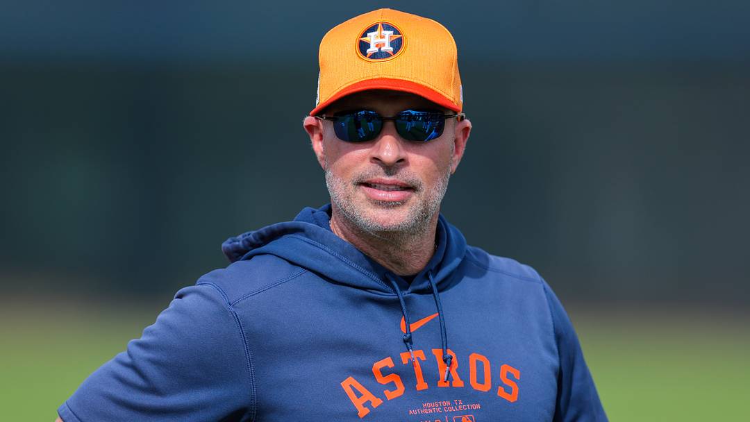 Astros manager Joe Espada (19) looks on during a spring training workout  Credit: Sam Navarro-