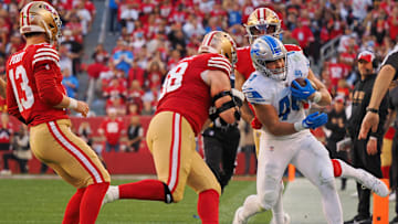 Jan 28, 2024; Santa Clara, California, USA; Detroit Lions linebacker Malcolm Rodriguez (44) is knocked out of bounds by San Francisco 49ers defensive end Alex Barrett (58) after making an interception during the first half of the NFC Championship football game at Levi's Stadium. Mandatory Credit: Kelley L Cox-Imagn Images