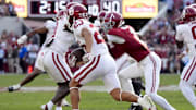 Nov 15, 2025; Tuscaloosa, Alabama, USA;  Oklahoma Sooners defensive back Eli Bowen (23) runs a interception back for a touchdown during the first half against the Alabama Crimson Tide at Saban Field at Bryant-Denny Stadium. Mandatory Credit: Gary Cosby-Imagn Images
