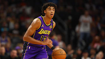 Oct 28, 2024; Phoenix, Arizona, USA; Los Angeles Lakers guard Max Christie (12) against the Phoenix Suns at Footprint Center. Mandatory Credit: Mark J. Rebilas-Imagn Images