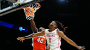 Nov 24, 2025; Las Vegas, Nevada, USA; Syracuse Orange forward William Kyle III (42) drives to the hoop past Houston Cougars forward Joseph Tugler (11) during the second half of a 2025 Players Era Festival group play game at MGM Grand Garden Arena. Mandatory Credit: Stephen R. Sylvanie-Imagn Images