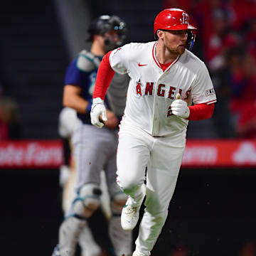 Aug 30, 2024; Anaheim, California, USA; Los Angeles Angels second baseman Brandon Drury (23) runs after hitting an RBI single against the Seattle Mariners during the sixth inning at Angel Stadium. Mandatory Credit: Gary A. Vasquez-Imagn Images