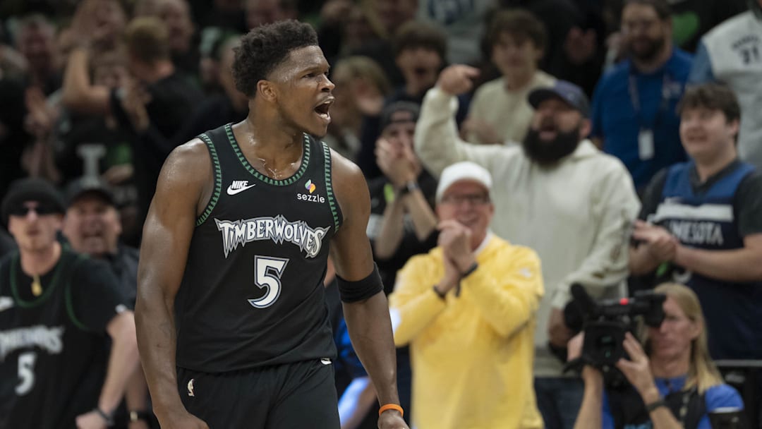 May 8, 2026; Minneapolis, Minnesota, USA; Minnesota Timberwolves guard Anthony Edwards (5) celebrates after making a three point shot as time expires in the first quarter against the San Antonio Spurs during game three of the second round of the 2026 NBA Playoffs at Target Center. Mandatory Credit: Jesse Johnson-Imagn Images