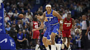 Dec 5, 2025; Orlando, Florida, USA; Orlando Magic forward Paolo Banchero (5) reacts after a basket against the Miami Heat in the first quarter at Kia Center. Mandatory Credit: Nathan Ray Seebeck-Imagn Images