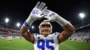 Sep 9, 2023; San Diego, California, USA; UCLA Bruins defensive lineman Sitiveni Havili-Kaufusi (95) waves to the crowd after the game against the San Diego State Aztecs at Snapdragon Stadium. Mandatory Credit: Orlando Ramirez-Imagn Images