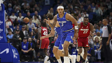 Dec 5, 2025; Orlando, Florida, USA; Orlando Magic forward Paolo Banchero (5) reacts after a basket against the Miami Heat in the first quarter at Kia Center. Mandatory Credit: Nathan Ray Seebeck-Imagn Images