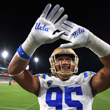 Sep 9, 2023; San Diego, California, USA; UCLA Bruins defensive lineman Sitiveni Havili-Kaufusi (95) waves to the crowd after the game against the San Diego State Aztecs at Snapdragon Stadium. Mandatory Credit: Orlando Ramirez-Imagn Images
