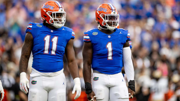 Florida Gators defensive end Kelby Collins (11) and Florida Gators defensive end Princely Umanmielen (1) wait for a play call during the first half against the Vanderbilt Commodores at Steve Spurrier Field at Ben Hill Griffin Stadium in Gainesville, FL on Saturday, October 7, 2023. [Matt Pendleton/Gainesville Sun]