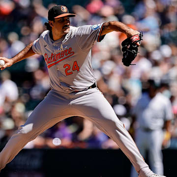 Sep 1, 2024; Denver, Colorado, USA; Baltimore Orioles starting pitcher Zach Eflin (24) pitches in the first inning against the Colorado Rockies at Coors Field.