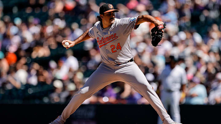 Sep 1, 2024; Denver, Colorado, USA; Baltimore Orioles starting pitcher Zach Eflin (24) pitches in the first inning against the Colorado Rockies at Coors Field.