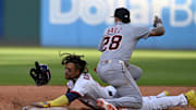 Oct 2, 2025; Cleveland, Ohio, USA; Cleveland Guardians third baseman Jose Ramirez (11) is tagged out at second by Detroit Tigers outfielder Javier Baez (28) in the eighth inning during game three of the Wildcard round for the 2025 MLB playoffs at Progressive Field. Mandatory Credit: Ken Blaze-Imagn Images