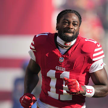 Sep 9, 2024; Santa Clara, California, USA; San Francisco 49ers wide receiver Brandon Aiyuk (11) is introduced to the crowd before the game against the New York Jets at Levi's Stadium. Mandatory Credit: Darren Yamashita-Imagn Images