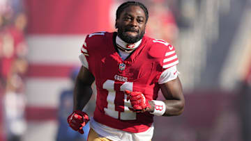 Sep 9, 2024; Santa Clara, California, USA; San Francisco 49ers wide receiver Brandon Aiyuk (11) is introduced to the crowd before the game against the New York Jets at Levi's Stadium. Mandatory Credit: Darren Yamashita-Imagn Images