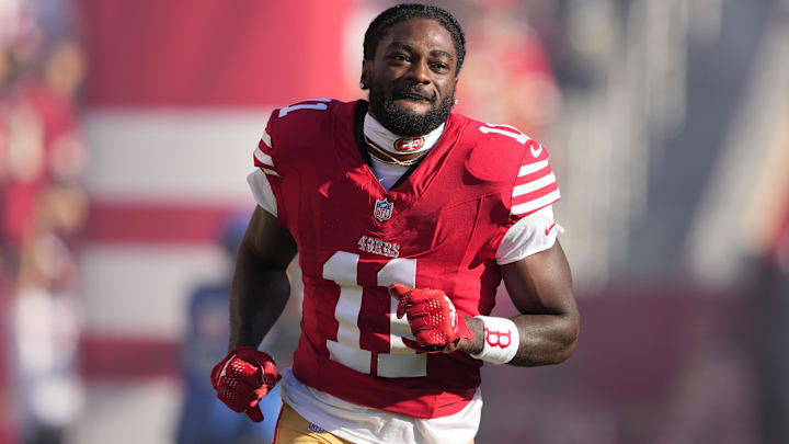 Sep 9, 2024; Santa Clara, California, USA; San Francisco 49ers wide receiver Brandon Aiyuk (11) is introduced to the crowd before the game against the New York Jets at Levi's Stadium. Mandatory Credit: Darren Yamashita-Imagn Images