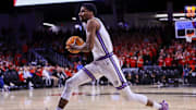 Mar 5, 2025; Cincinnati, Ohio, USA; Kansas State Wildcats guard David N'Guessan (1) drives to the basket against the Cincinnati Bearcats in the second half at Fifth Third Arena. Mandatory Credit: Katie Stratman-Imagn Images