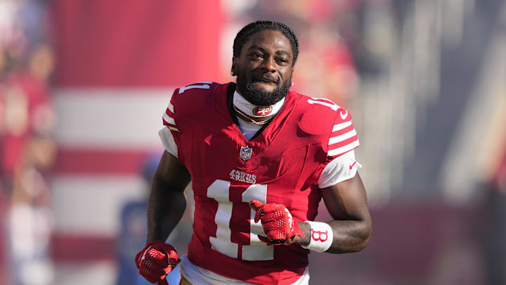 Sep 9, 2024; Santa Clara, California, USA; San Francisco 49ers wide receiver Brandon Aiyuk (11) is introduced to the crowd before the game against the New York Jets at Levi's Stadium. Mandatory Credit: Darren Yamashita-Imagn Images