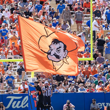 Sep 14, 2024; Tulsa, Oklahoma, USA;  The Oklahoma State Cowboys flag is flown in the end zone after a score against the Tulsa Golden Hurricane during the third quarter at Skelly Field at H.A. Chapman Stadium. Mandatory Credit: Brett Rojo-Imagn Images