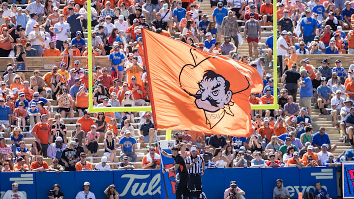 Sep 14, 2024; Tulsa, Oklahoma, USA;  The Oklahoma State Cowboys flag is flown in the end zone after a score against the Tulsa Golden Hurricane during the third quarter at Skelly Field at H.A. Chapman Stadium. Mandatory Credit: Brett Rojo-Imagn Images