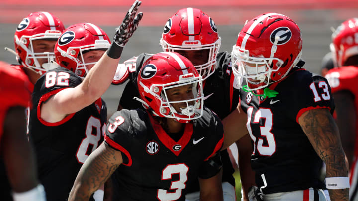 Georgia running back Andrew Paul (3) celebrates with his teammates after scoring a touchdown during the G-Day spring football game in Athens, Ga., on Saturday, April 13, 2024.