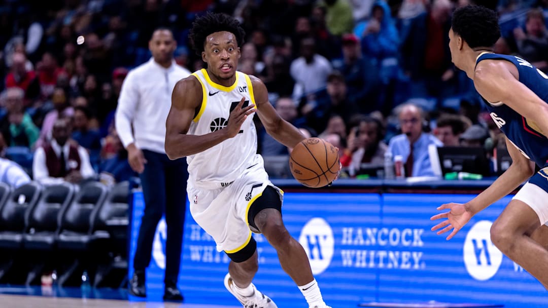 Jan 17, 2025; New Orleans, Louisiana, USA; Utah Jazz guard Collin Sexton (2) brings the ball up court against New Orleans Pelicans guard Trey Murphy III (25) during the second half at Smoothie King Center. Mandatory Credit: Stephen Lew-Imagn Images