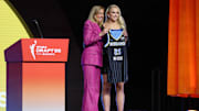 Apr 14, 2025; New York, New York, USA;  Hailey Van Lith poses with WNBA commissioner Cathy Engelbert after being selected with the number eleven overall pick to the Chicago Sky in the 2025 WNBA Draft at The Shed at Hudson Yards. Mandatory Credit: Vincent Carchietta-Imagn Images