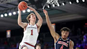 Davidson Wildcats forward Reed Bailey (1) shoots over Arizona Wildcats forward Trey Townsend (4) during the first half at the Atlantis Resort.