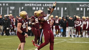 Dec 28, 2023; Boston, MA, USA; Boston College Eagles linebacker Kam Arnold (5) reacts to his tackle during the second half against the Southern Methodist Mustangs at Fenway Park. Mandatory Credit: Eric Canha-USA TODAY Sports