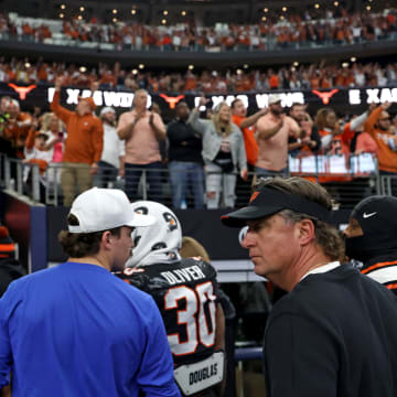 Oklahoma State football head coach Mike Gundy walks of the field following the Big 12 Football Championship game between the Oklahoma State University Cowboys and the Texas Longhorns at the AT&T Stadium in Arlington, Texas, Saturday, Dec. 2, 2023.