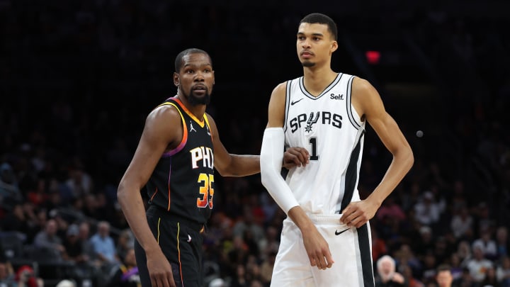 Oct 31, 2023; Phoenix, Arizona, USA; Phoenix Suns forward Kevin Durant #35 guards San Antonio Spurs center Victor Wembanyama #1 during the second half at Footprint Center. Mandatory Credit: Zachary BonDurant-USA TODAY Sports