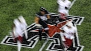 Nov 23, 2019; Cincinnati, OH, USA; A view of the American Athletic Conference logo on the field during the game between the Temple Owls and the Cincinnati Bearcats at Nippert Stadium. Mandatory Credit: Aaron Doster-Imagn Images