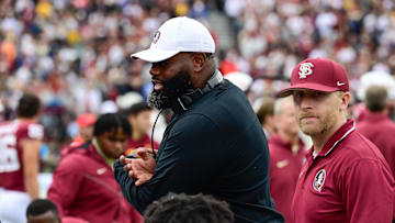 Sep 16, 2023; Chestnut Hill, Massachusetts, USA; Florida State Seminoles offensive coordinator Alex Atkins speaks to the team during the second half against the Boston College Eagles at Alumni Stadium. Mandatory Credit: Eric Canha-Imagn Images