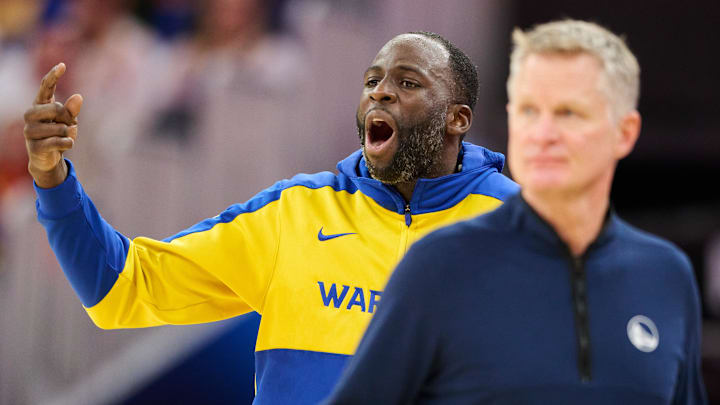 Dec 28, 2024; San Francisco, California, USA; Golden State Warriors forward Draymond Green (23) and head coach Steve Kerr react to game play against the Phoenix Suns during the third quarter at Chase Center. Mandatory Credit: Robert Edwards-Imagn Images