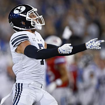 Sep 6, 2024; Dallas, Texas, USA; Brigham Young Cougars safety Crew Wakley (7) celebrates a fourth down stop against the Southern Methodist Mustangs to seal the win during the second half at Gerald J. Ford Stadium.