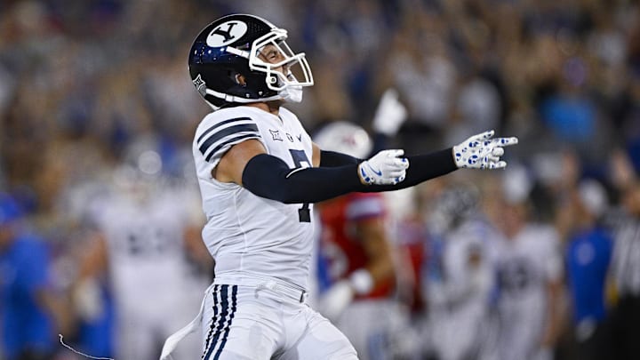 Sep 6, 2024; Dallas, Texas, USA; Brigham Young Cougars safety Crew Wakley (7) celebrates a fourth down stop against the Southern Methodist Mustangs to seal the win during the second half at Gerald J. Ford Stadium.