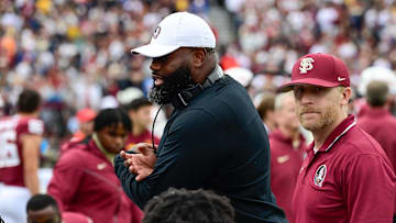 Sep 16, 2023; Chestnut Hill, Massachusetts, USA; Florida State Seminoles offensive coordinator Alex Atkins speaks to the team during the second half against the Boston College Eagles at Alumni Stadium. Mandatory Credit: Eric Canha-Imagn Images