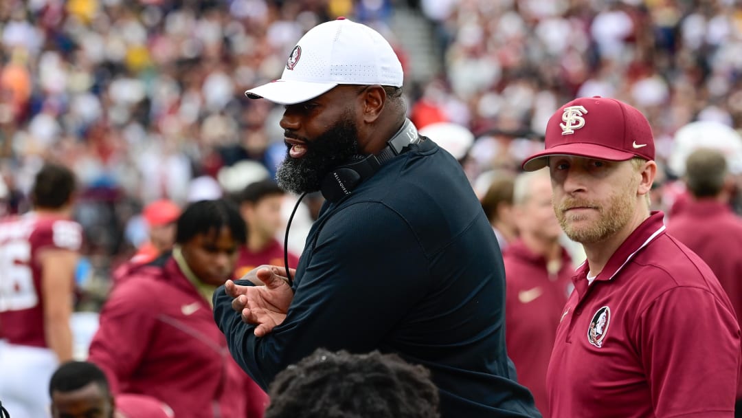 Sep 16, 2023; Chestnut Hill, Massachusetts, USA; Florida State Seminoles offensive coordinator Alex Atkins speaks to the team during the second half against the Boston College Eagles at Alumni Stadium. Mandatory Credit: Eric Canha-USA TODAY Sports