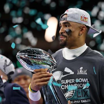 Feb 9, 2025; New Orleans, LA, USA; Philadelphia Eagles quarterback Jalen Hurts (1) celebrates after winning against Kansas City Chiefs in Super Bowl LIX at Caesars Superdome.
