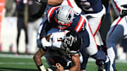 Nov 2, 2025; Foxborough, Massachusetts, USA; New England Patriots linebacker K'Lavon Chaisson (44) sacks Atlanta Falcons quarterback Michael Penix Jr. (9) during the first quarter at Gillette Stadium. Mandatory Credit: Brian Fluharty-Imagn Images
